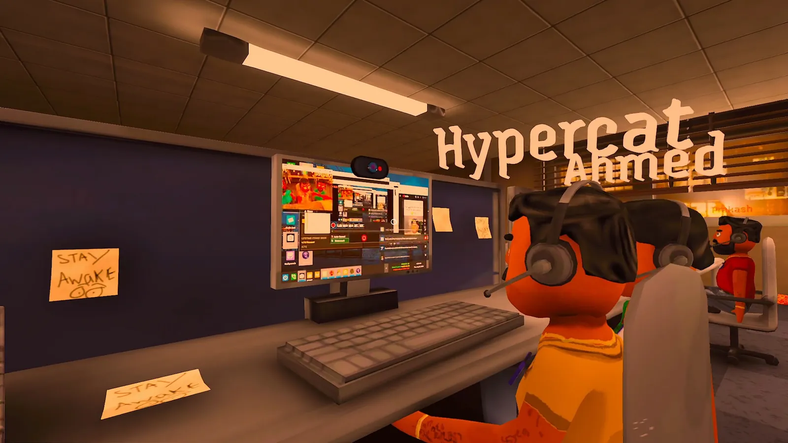 Over-the-shoulder view of a player character at a desk with a monitor on the call floor